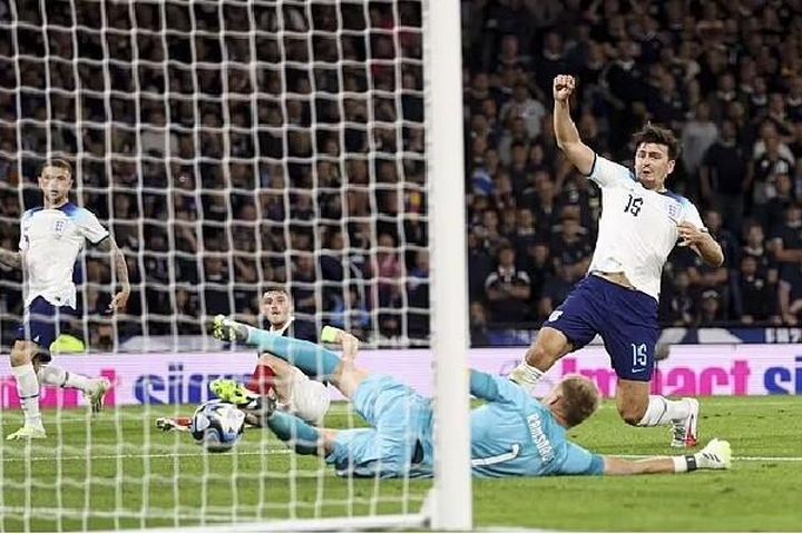 David Beckham chia sẻ kinh nghiệm với Harry Maguire